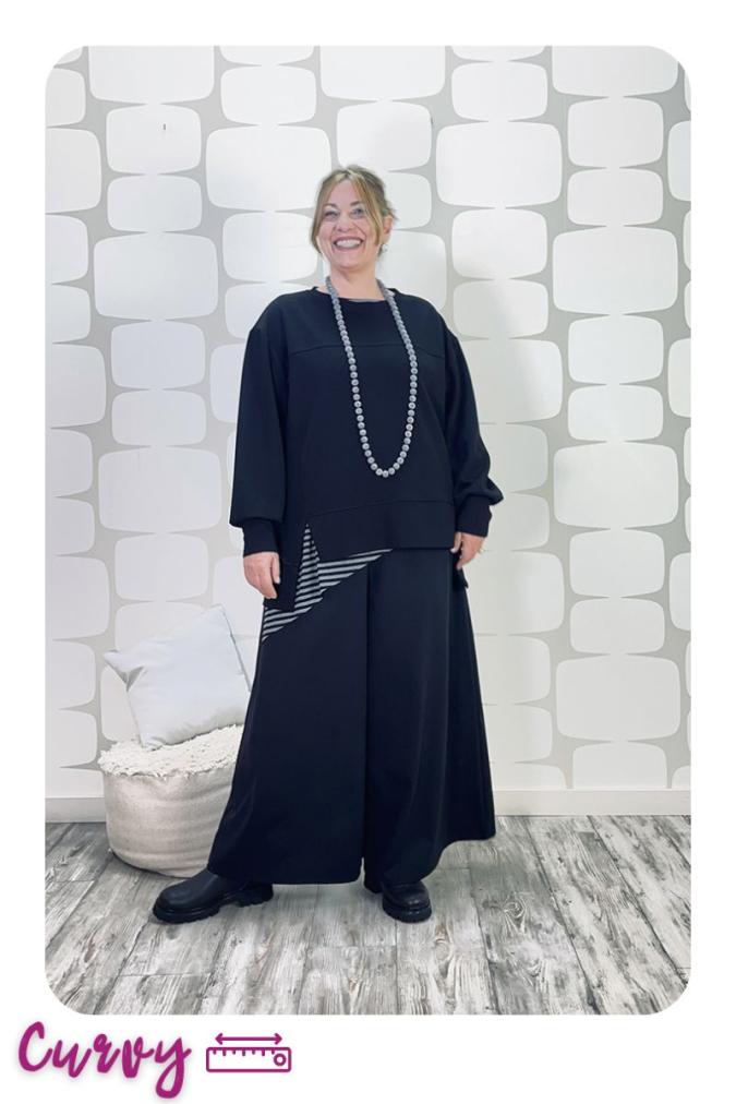 OUTFIT CURVY con Maglia Desdemona nero, canotta telly a righe sartoriale bianco e nero, pantalone Palace Karlsson sartoriale nero